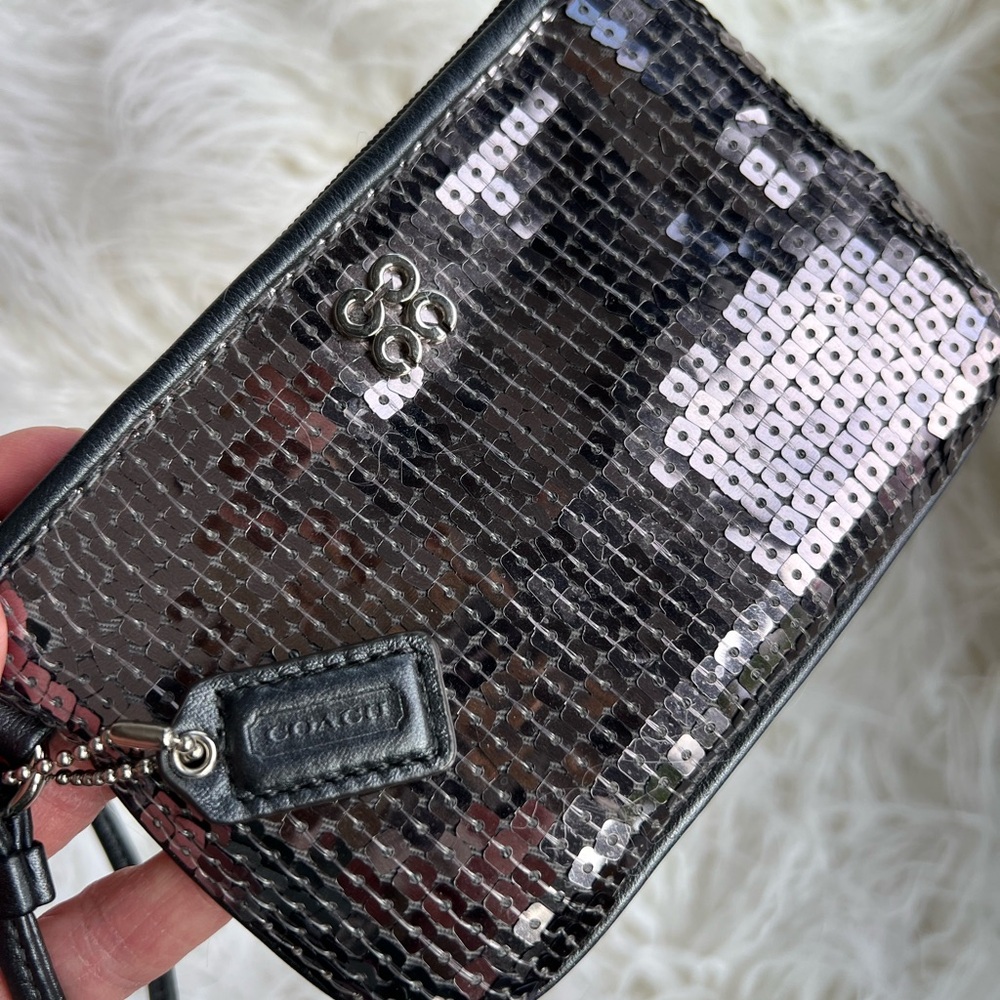 “✨ Sparkle with Style ✨ 
Silver Sequin Wristlet (Coach-Inspired)”